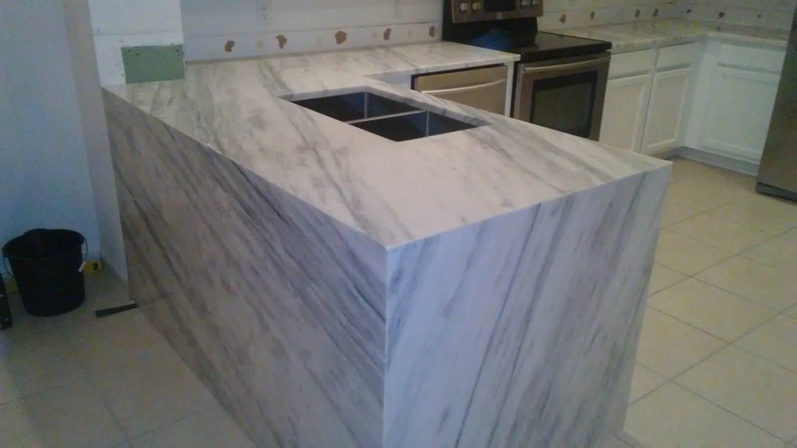 Statement Waterfall Island, view 2 — custom countertop project in Palm Beach County