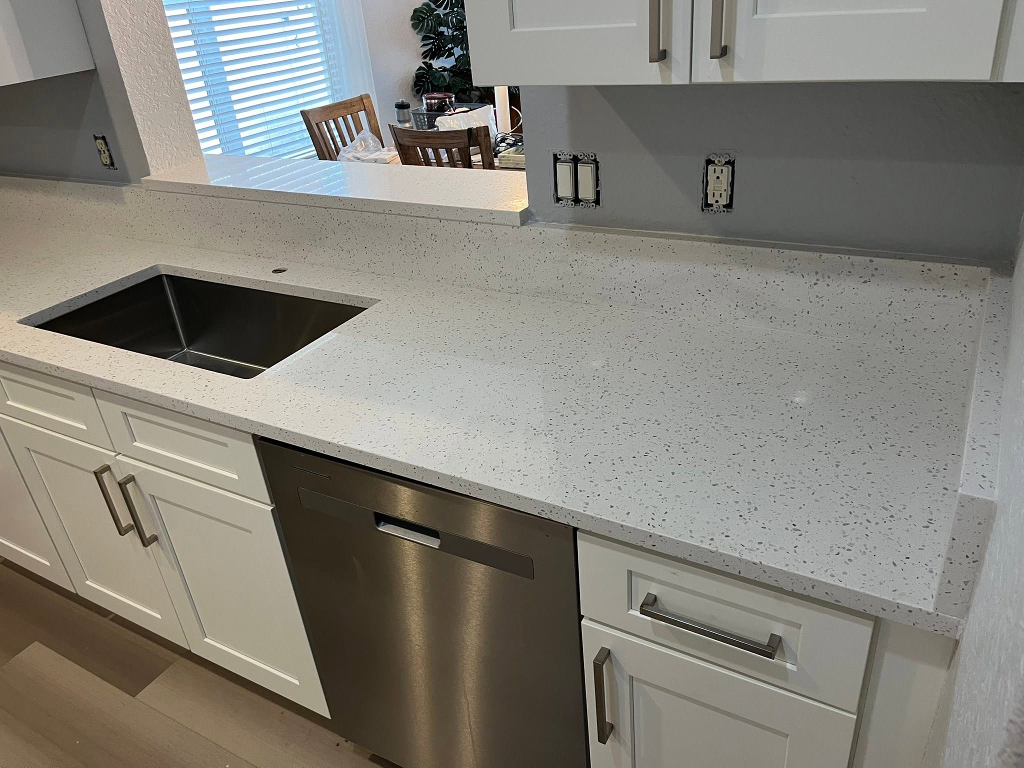 White quartz countertops installed in a modern Palm Beach County kitchen