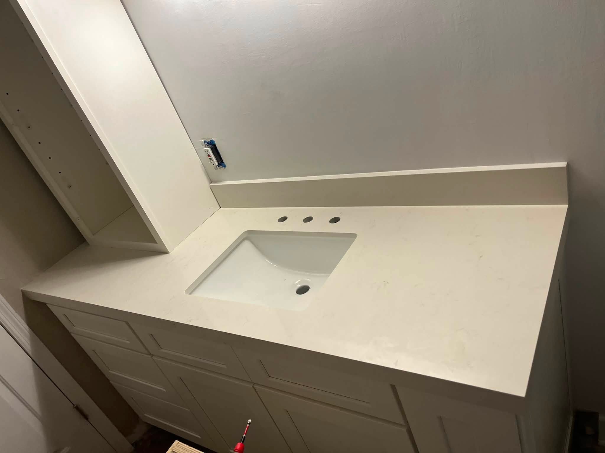Custom sink countertop with a clean waterfall edge